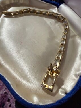 Gold-Tone Link bracelet with jade insets inside. Really unusual and rare